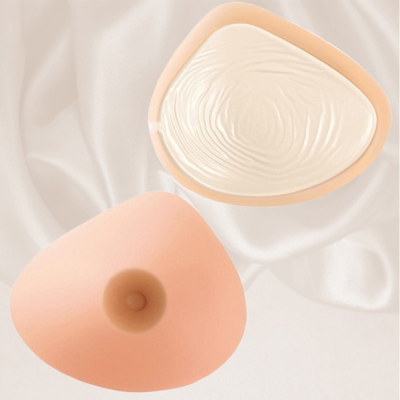 Faux seins silicone, forme asymétrique